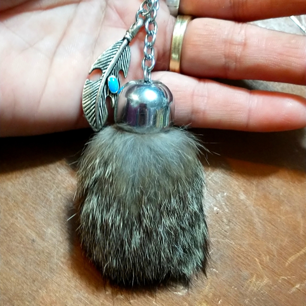 Lucky (REAL) Rabbit's Foot with a turquoise feather and a micro lock S-Biner.